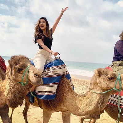 student on a camel.