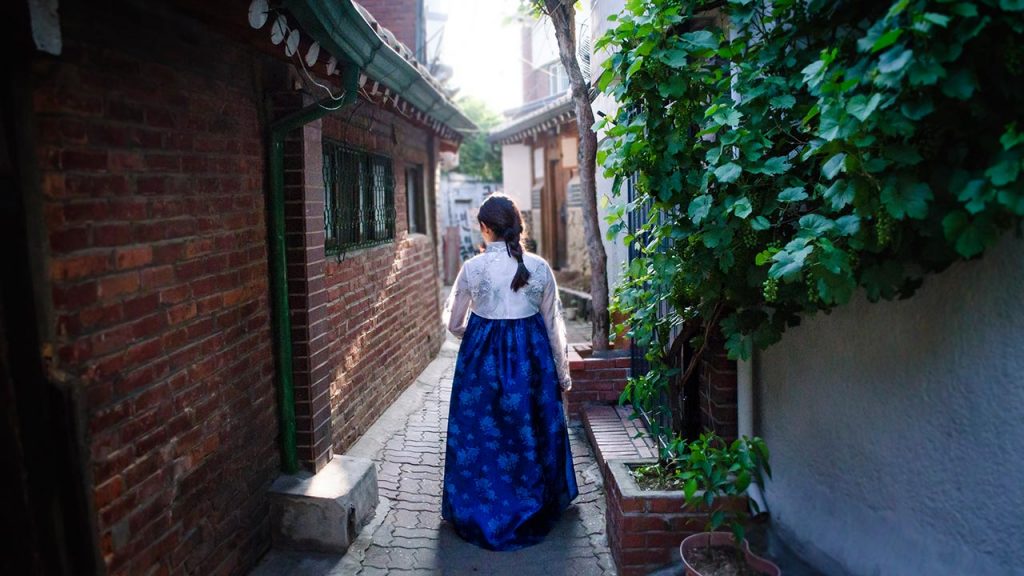 Student wears traditional clothing while studying abroad.